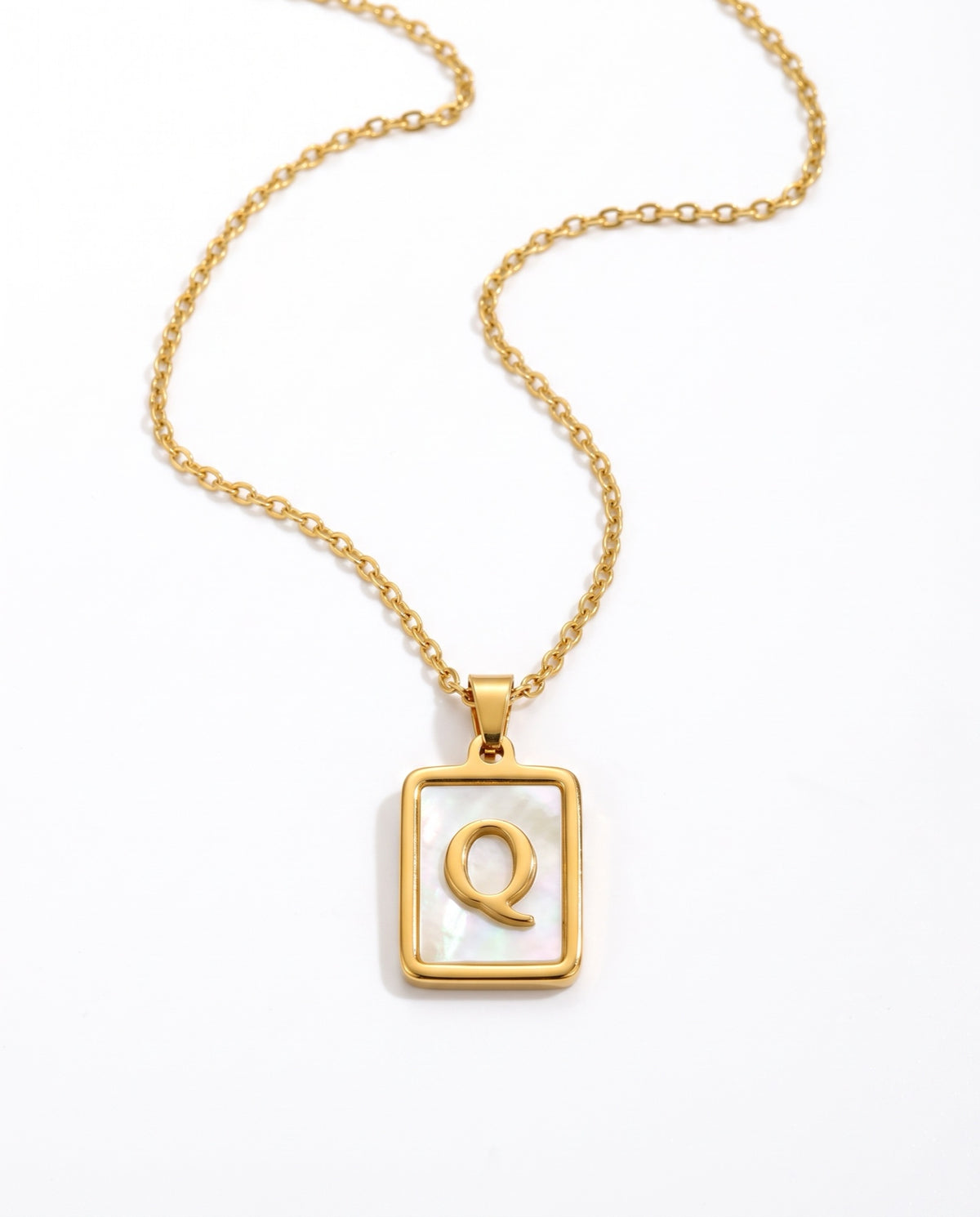 Dorado letra Q
