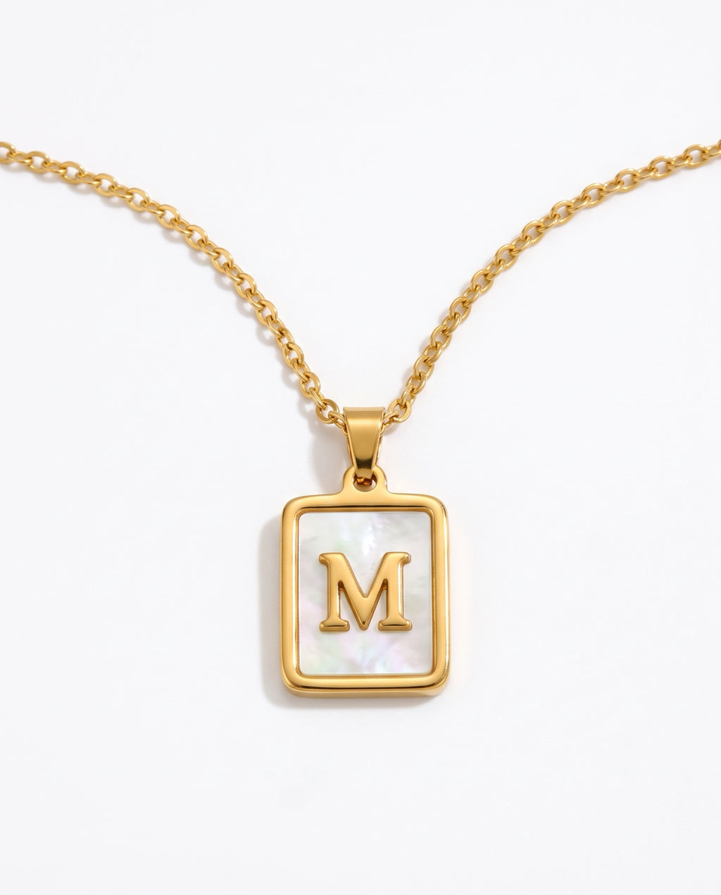 Dorado letra M