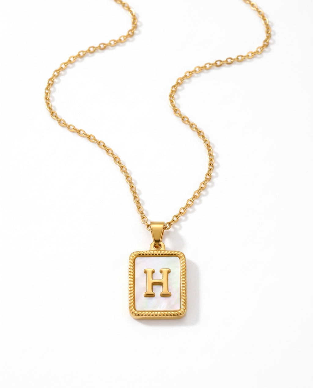 Dorado letra H